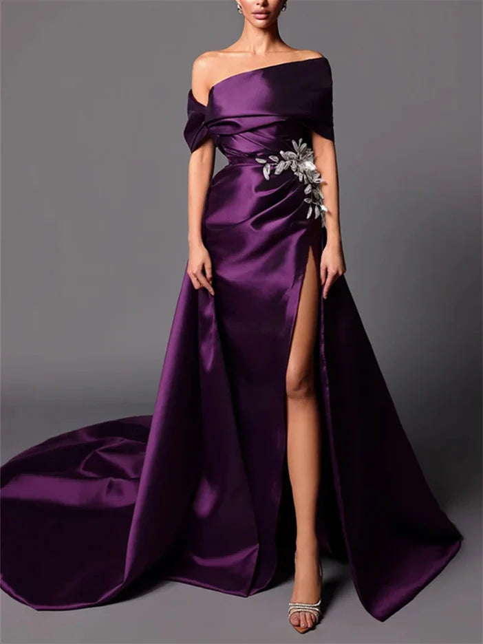 Elegant A-line off-shoulder evening dress with a sweep train, front view.