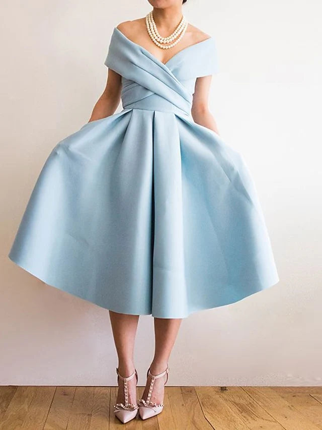 Back view of the A-Line off-shoulder tea length prom dress.