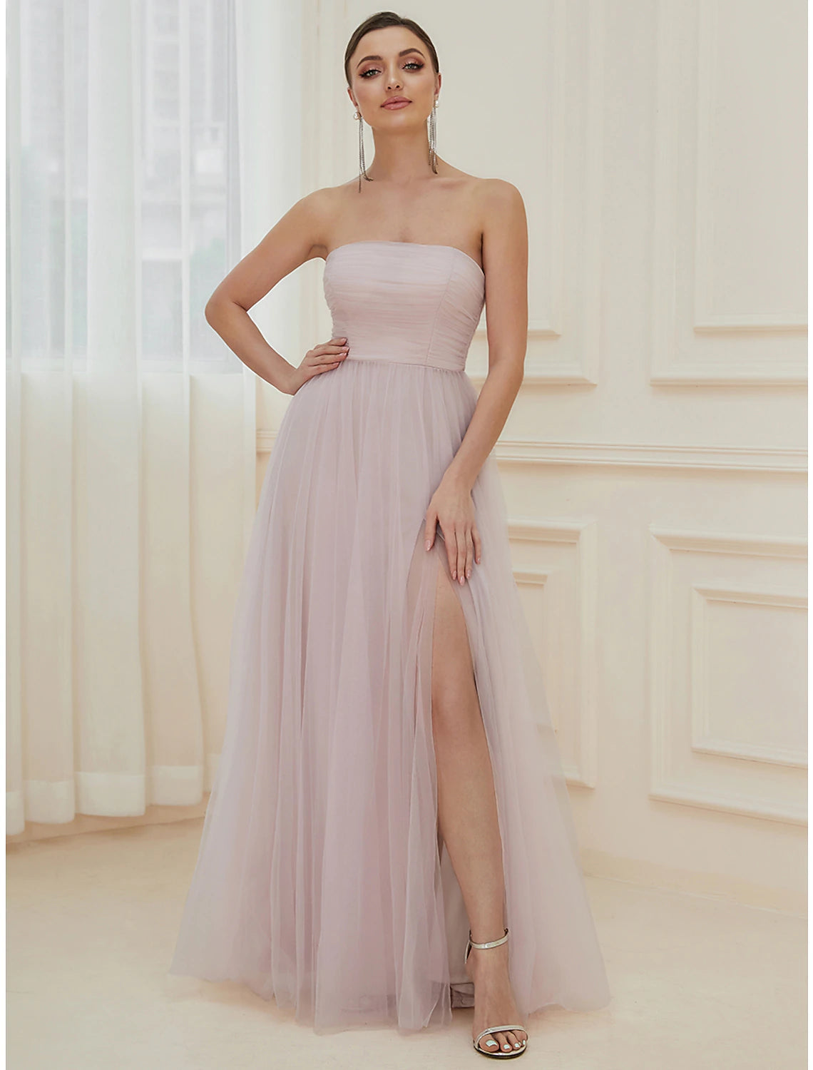 Elegant A-line off-shoulder tulle evening dress.