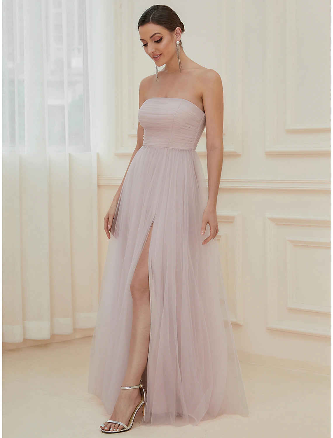 Side view of off-shoulder A-line formal dress.