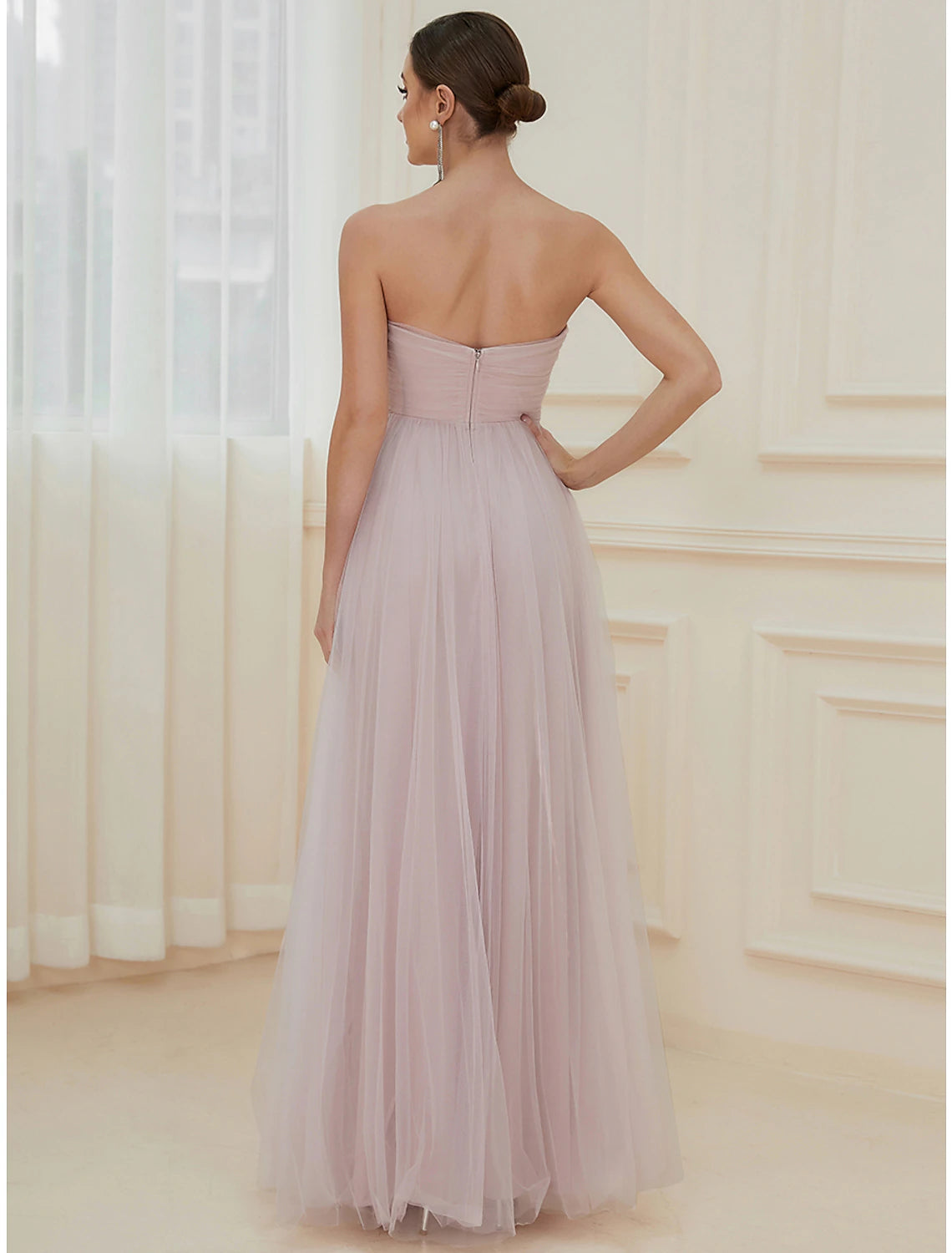 Close-up of tiered tulle fabric on evening gown.