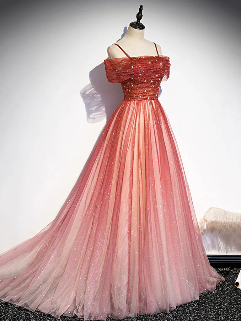 Full view of the flowing A-line tulle skirt of the long formal dress.