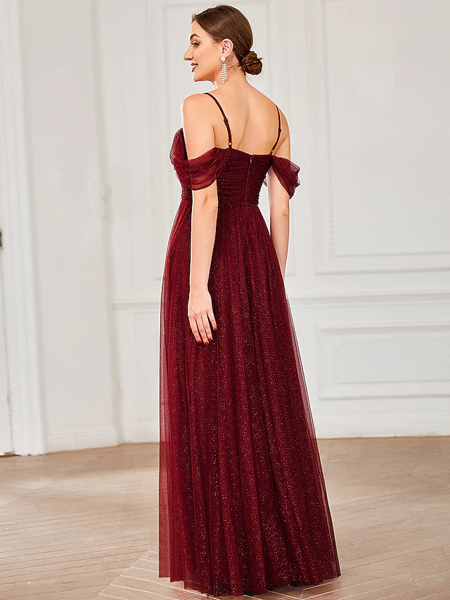 Side profile of floor-length A-line bridesmaid gown.