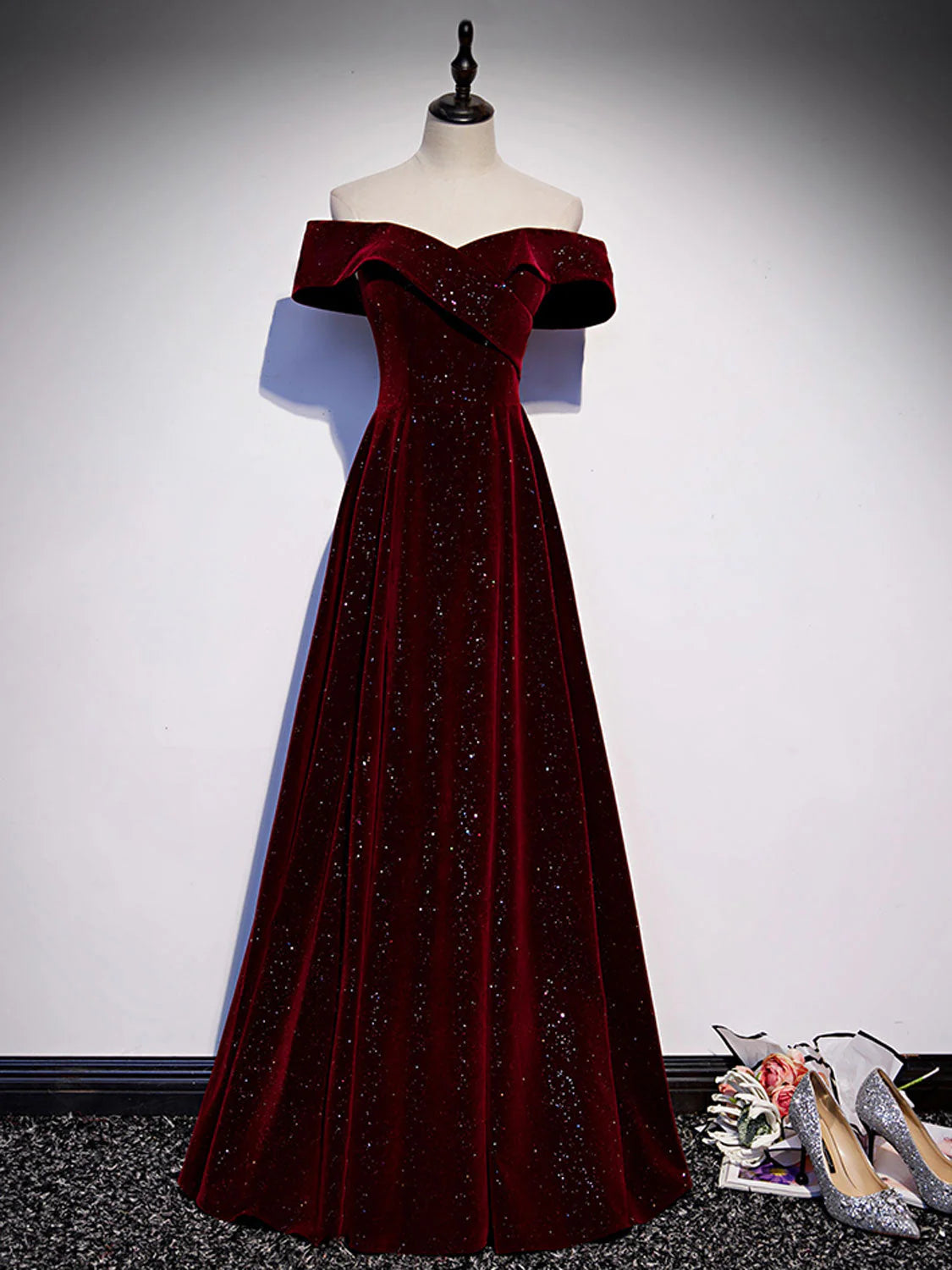 A-line off-shoulder V-neck velvet long prom dress.