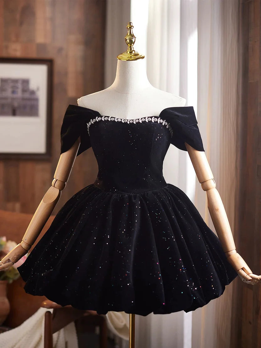 Black velvet A-line short homecoming dress with off-shoulder neckline and glitter.