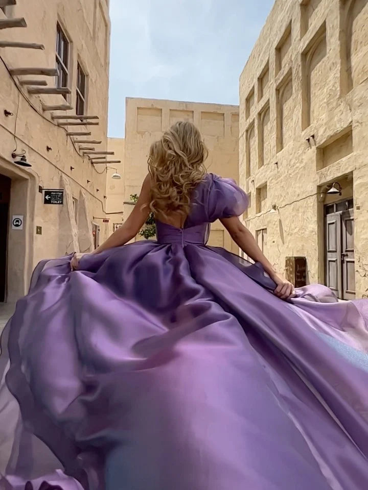 Back view of an A-line one-shoulder ankle-length dress.