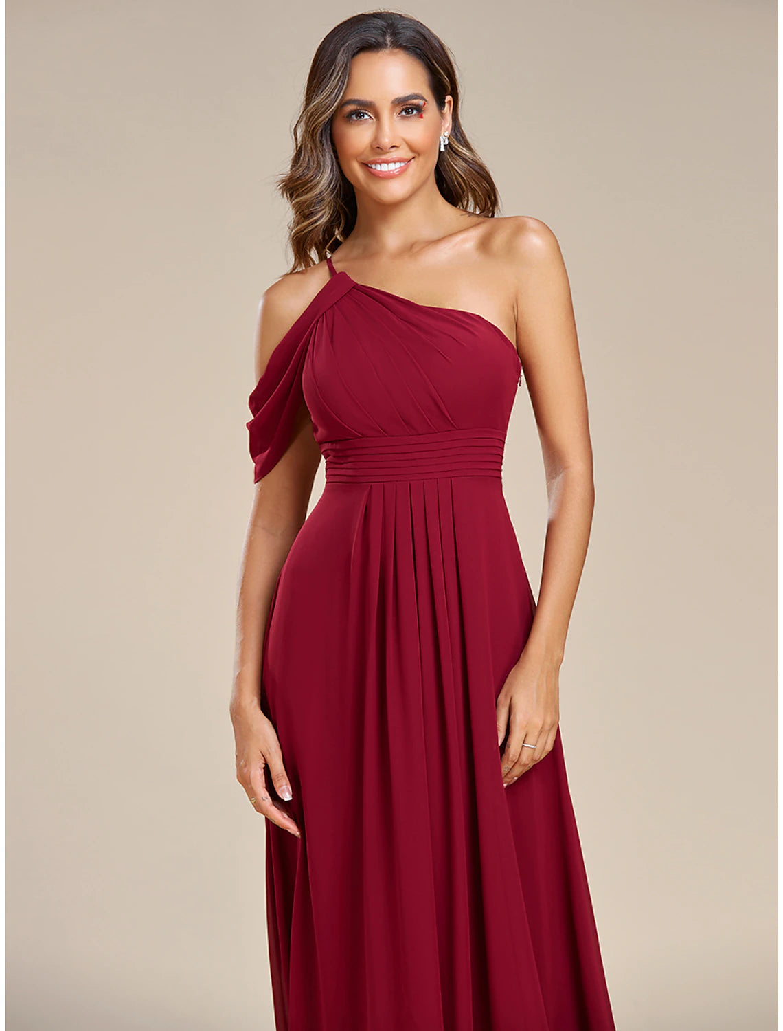 Model showcasing the back view of the A-line one-shoulder chiffon dress with a flowing skirt.