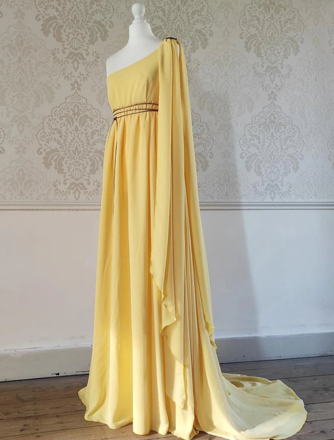 Side view of the A-line one-shoulder chiffon dress.
