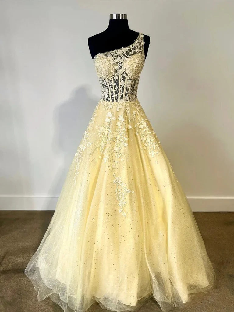 Woman wearing an elegant one-shoulder lace A-line long prom dress.
