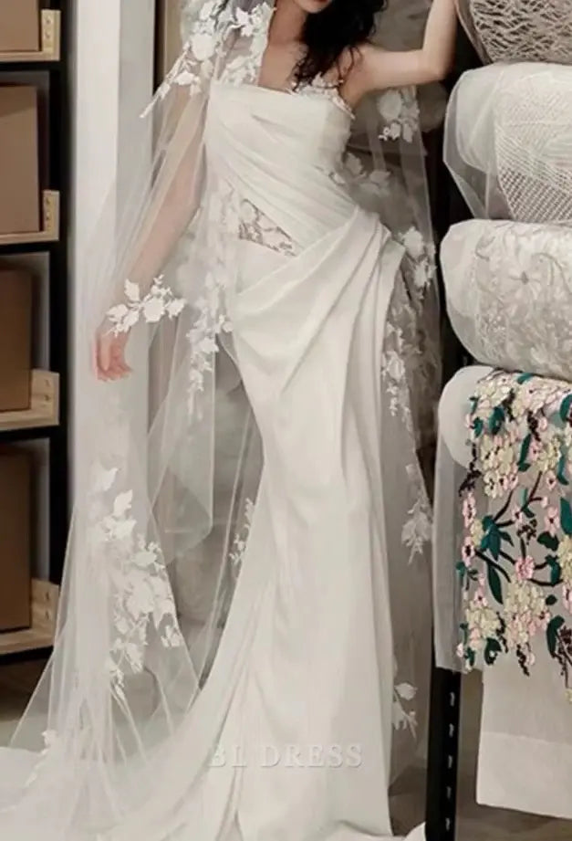 Elegant white A-line one-shoulder dress with lace detail.