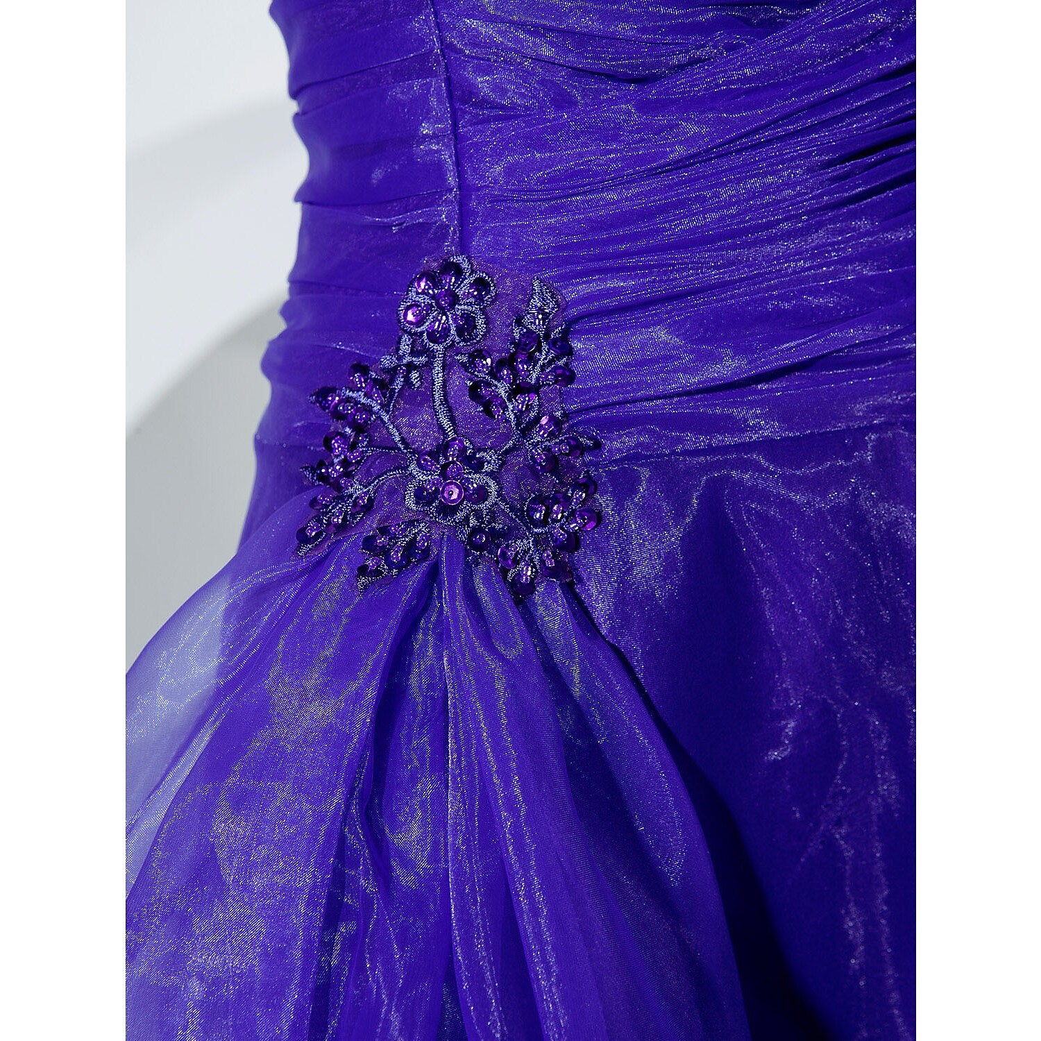 Full length view of the sleeveless one-shoulder dress.