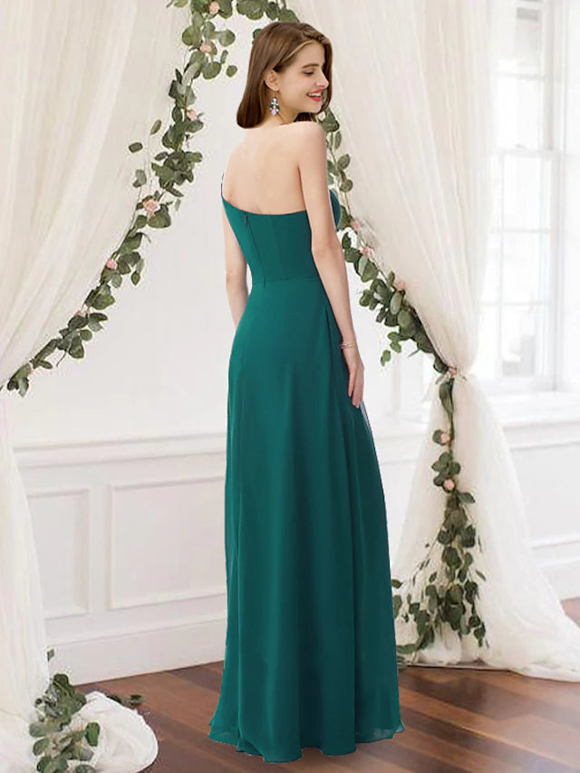 Floor-length pleated A-Line bridesmaid gown.