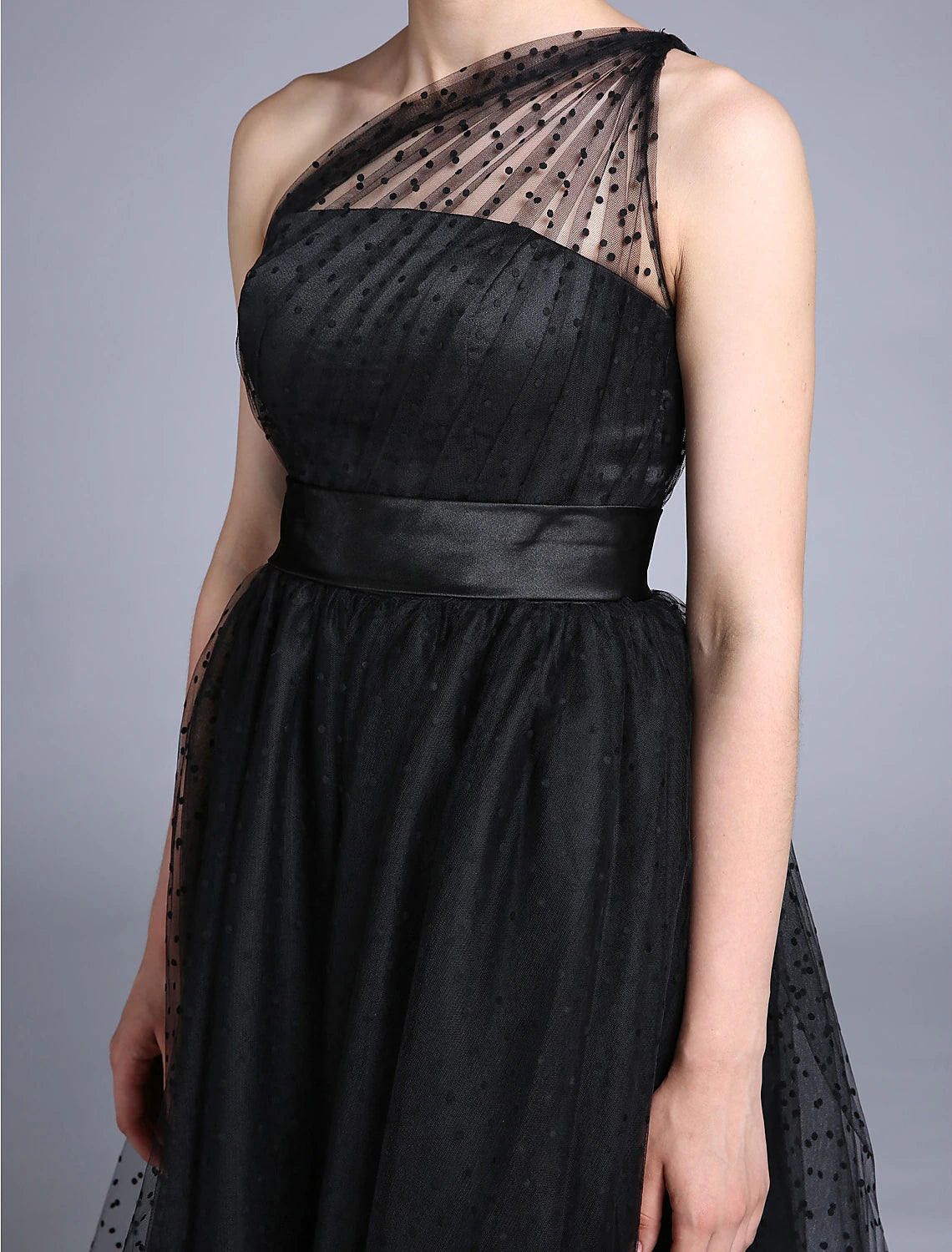 Model wearing the A-line cocktail dress, showcasing its flowing silhouette.