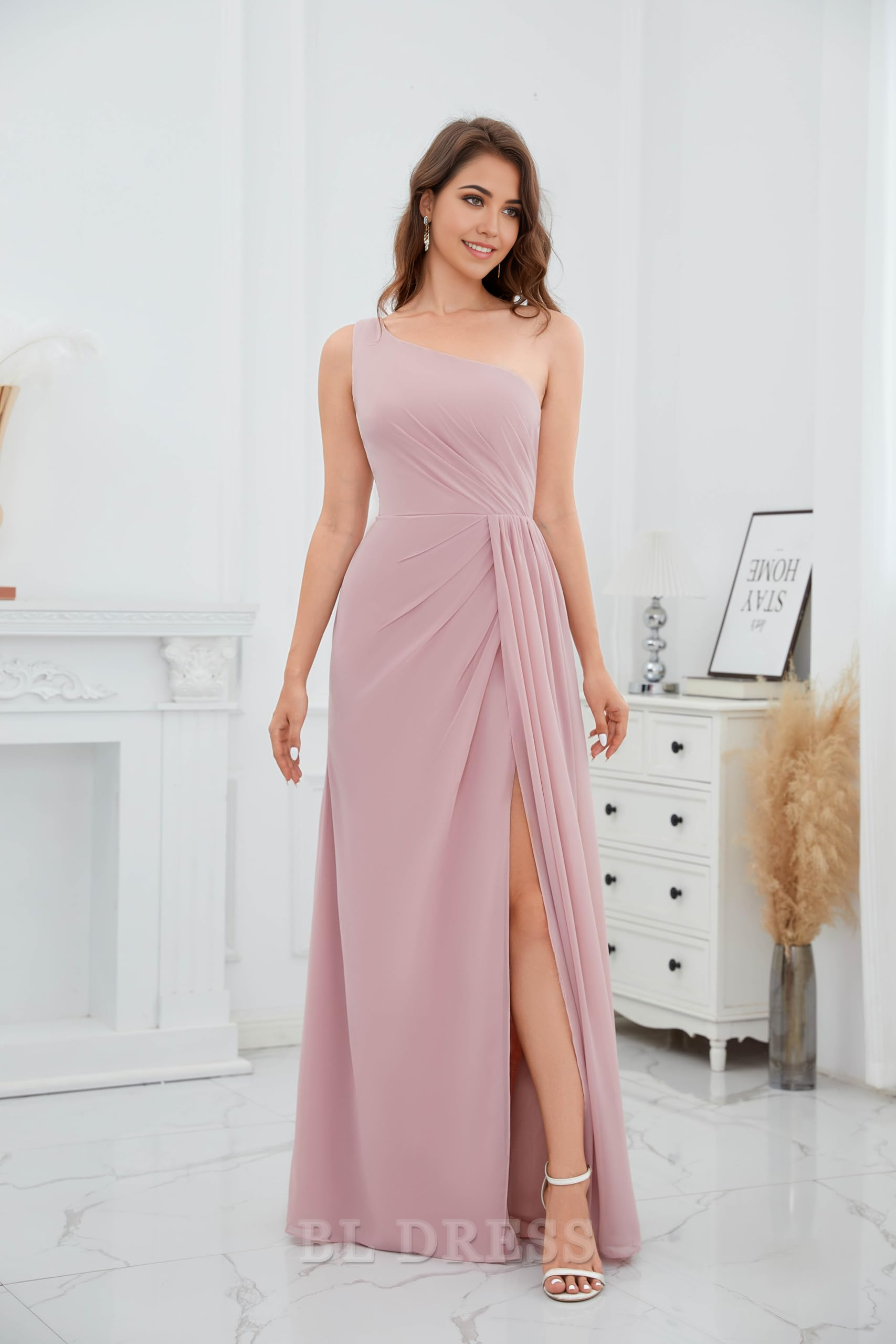 Back view of the teal A-line one-shoulder ruched chiffon formal gown.