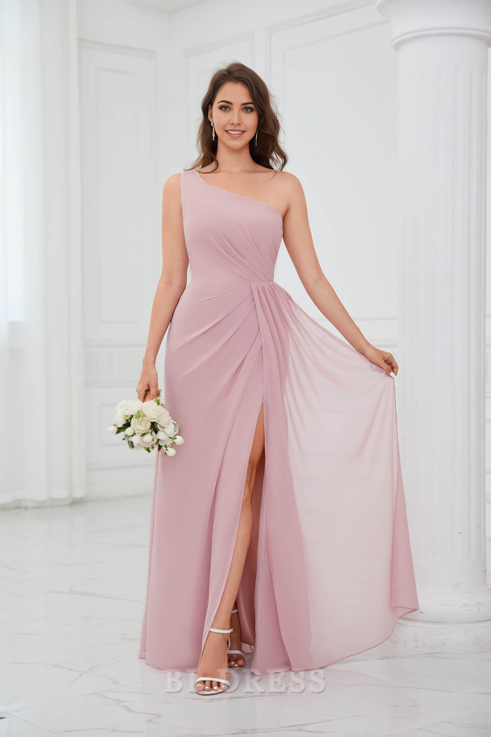 Close-up of the ruched one-shoulder bodice on a teal chiffon dress.