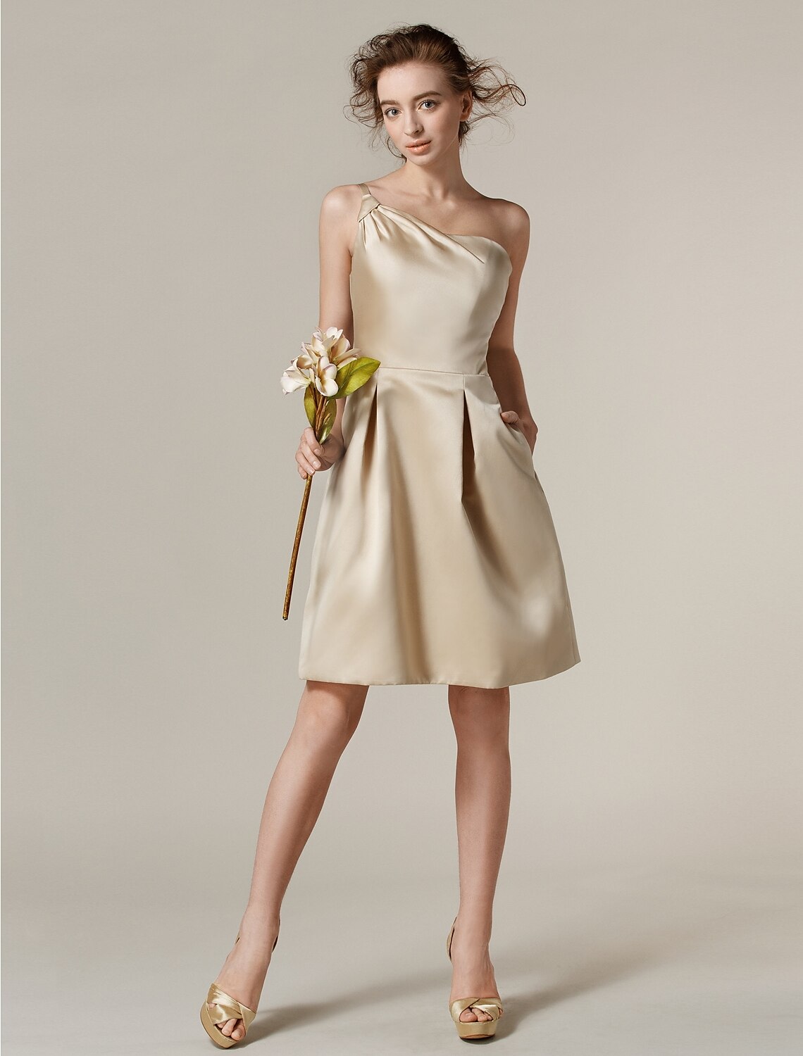 A-Line one-shoulder satin bridesmaid dress with side draping, knee length.
