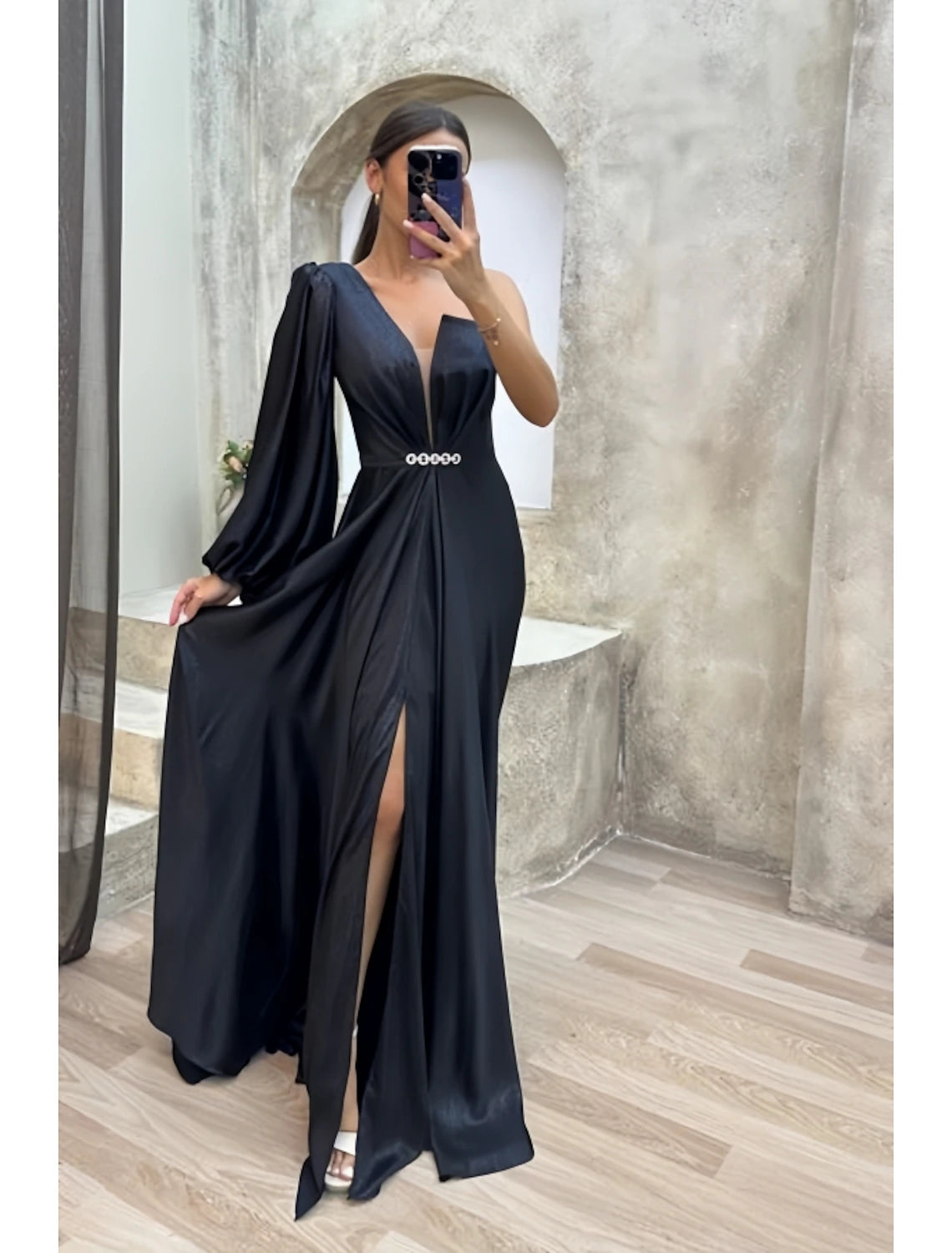 Elegant A-line one-shoulder satin gown with high slit and pleats.