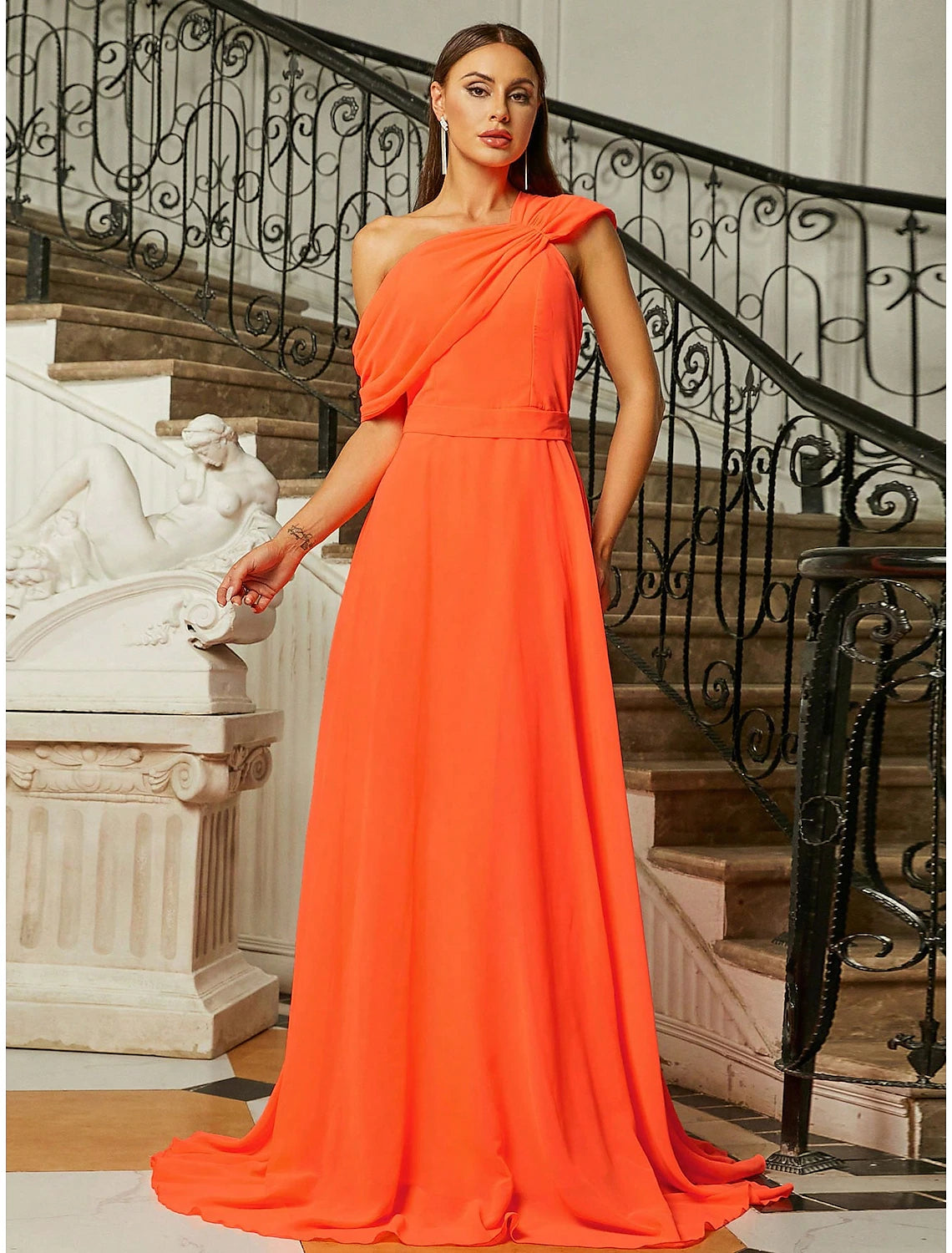 Back view of the A-line evening gown showing the sweep train.