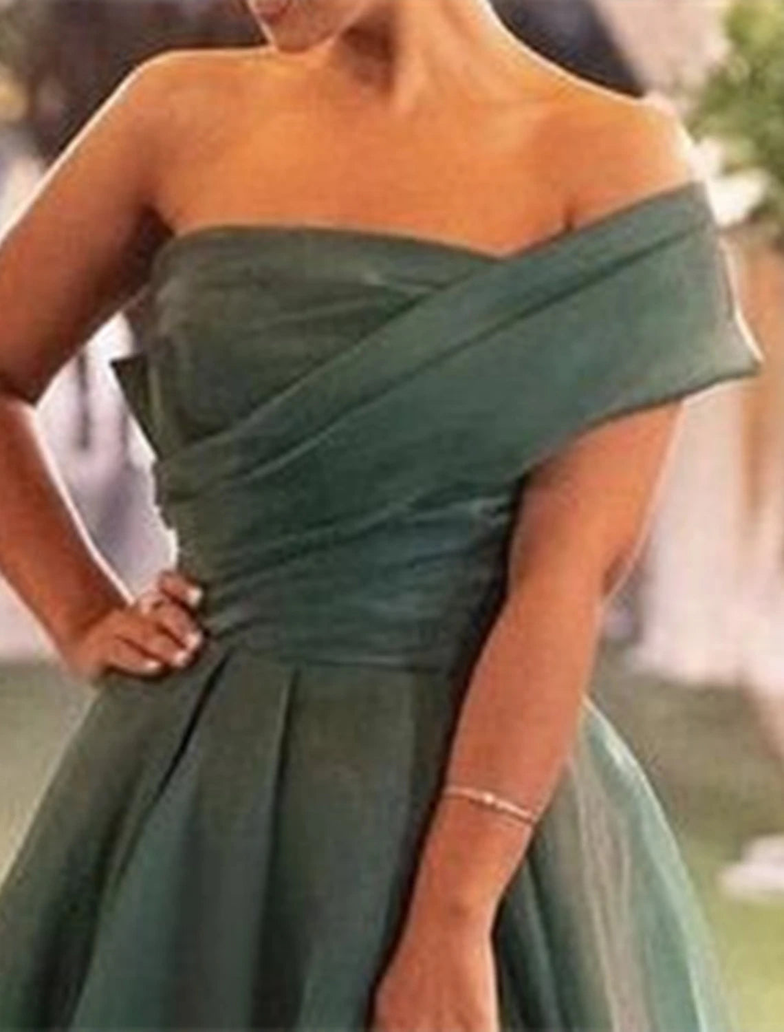 Back view of the A-Line evening gown, highlighting the elegant sweep train.