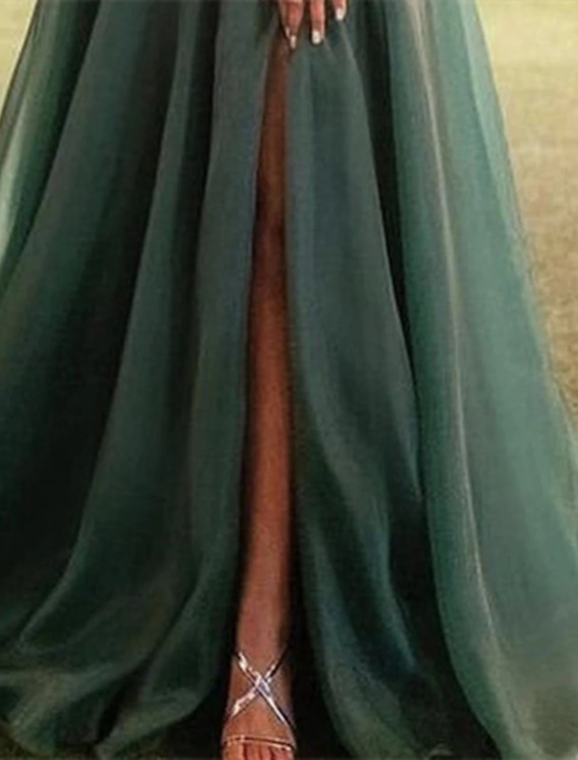 Model posing in the A-Line one-shoulder gown, emphasizing its formal appeal.