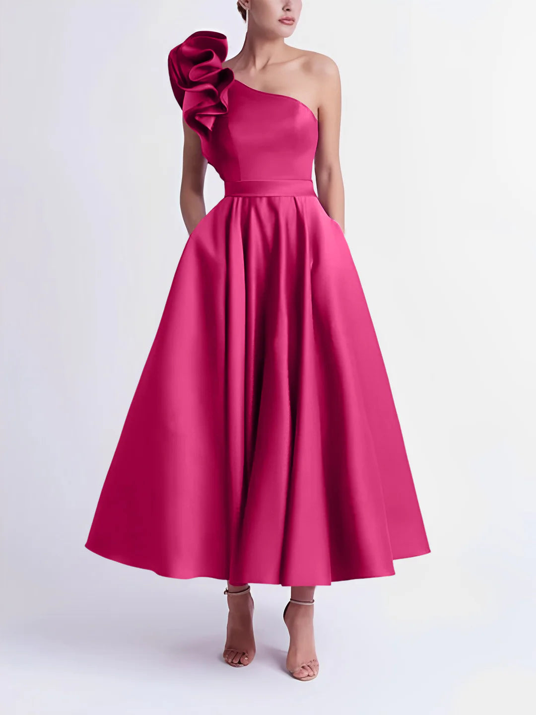 Model wearing a pink A-line one-shoulder tea-length prom dress.