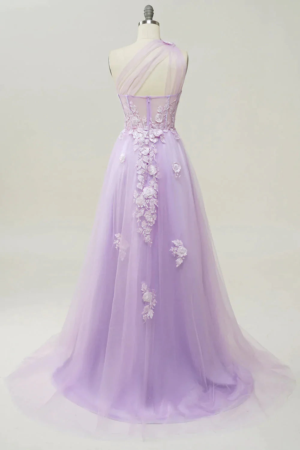 Back view of A-line purple tulle prom dress with appliques.