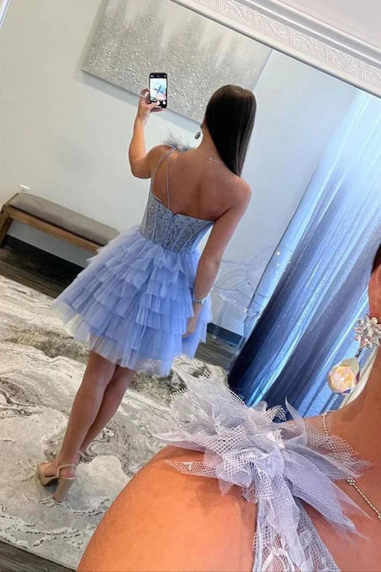 Back view of an elegant A-line one-shoulder tulle homecoming dress.