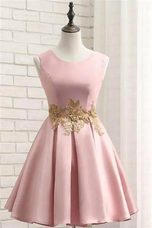 Pink A-line short satin homecoming dress with gold applique.