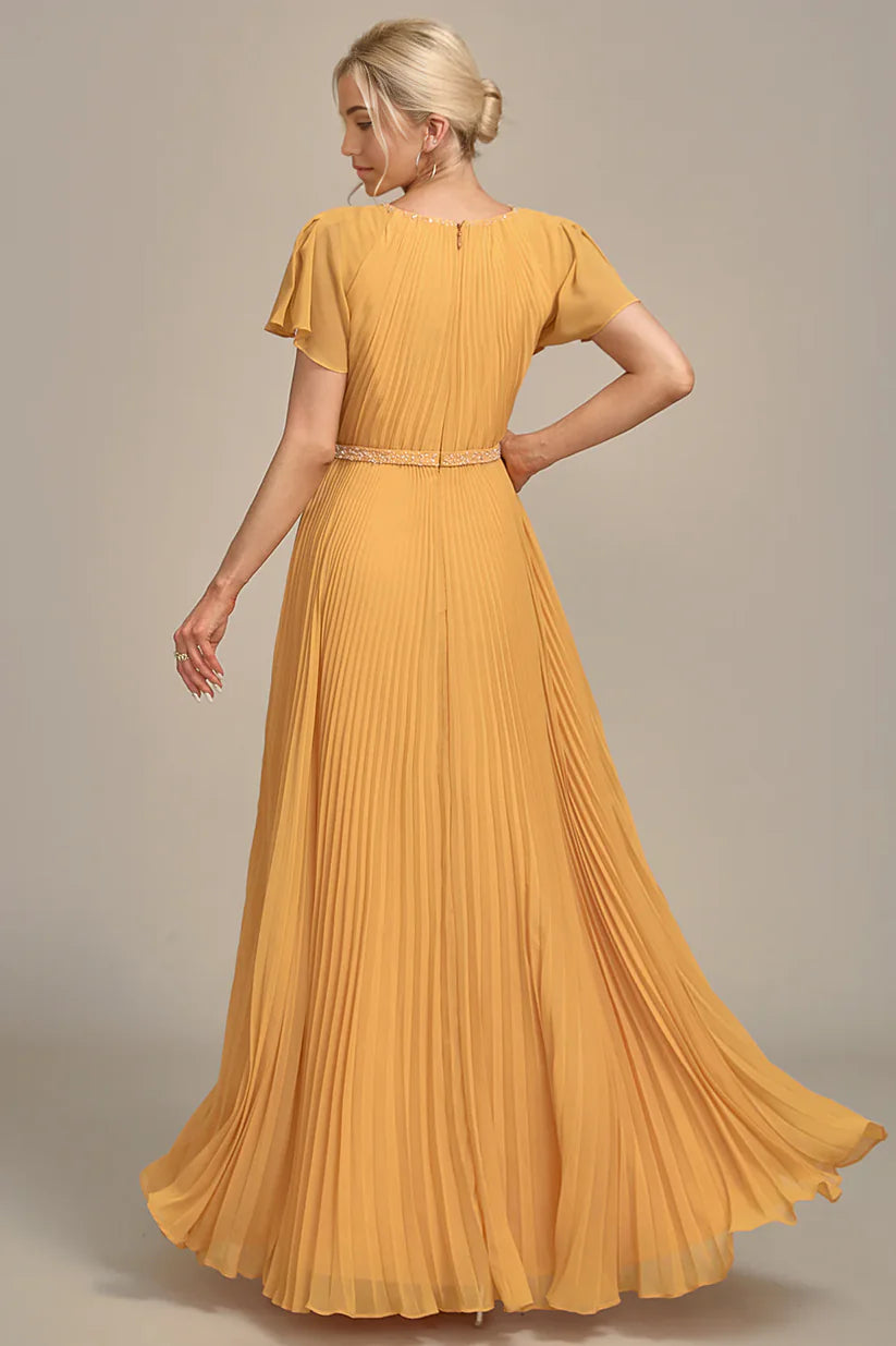 Model wearing a sophisticated short sleeve A-line gown.