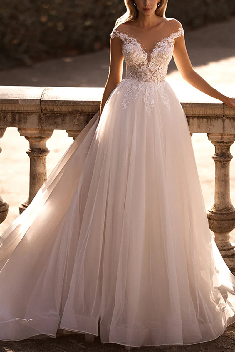 Elegant A-line wedding dress with lace appliques and a plunge neckline.