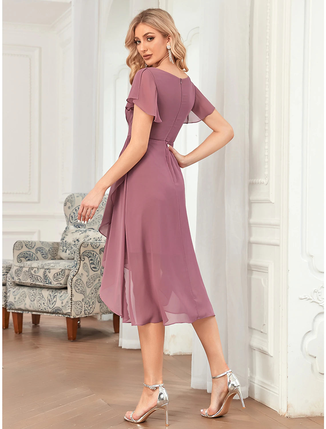 Back view of an A-line plunging neck bridesmaid dress.