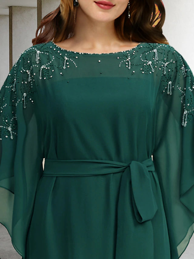 Back view of an A-line plus size mother of the bride chiffon gown.