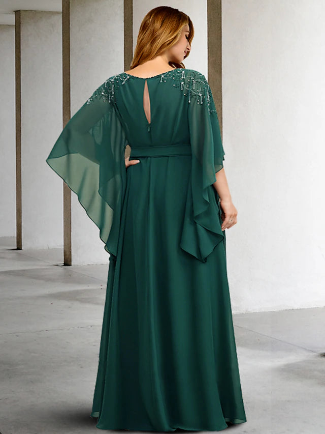 Close-up of the jewel neck and beading detail on a chiffon gown.