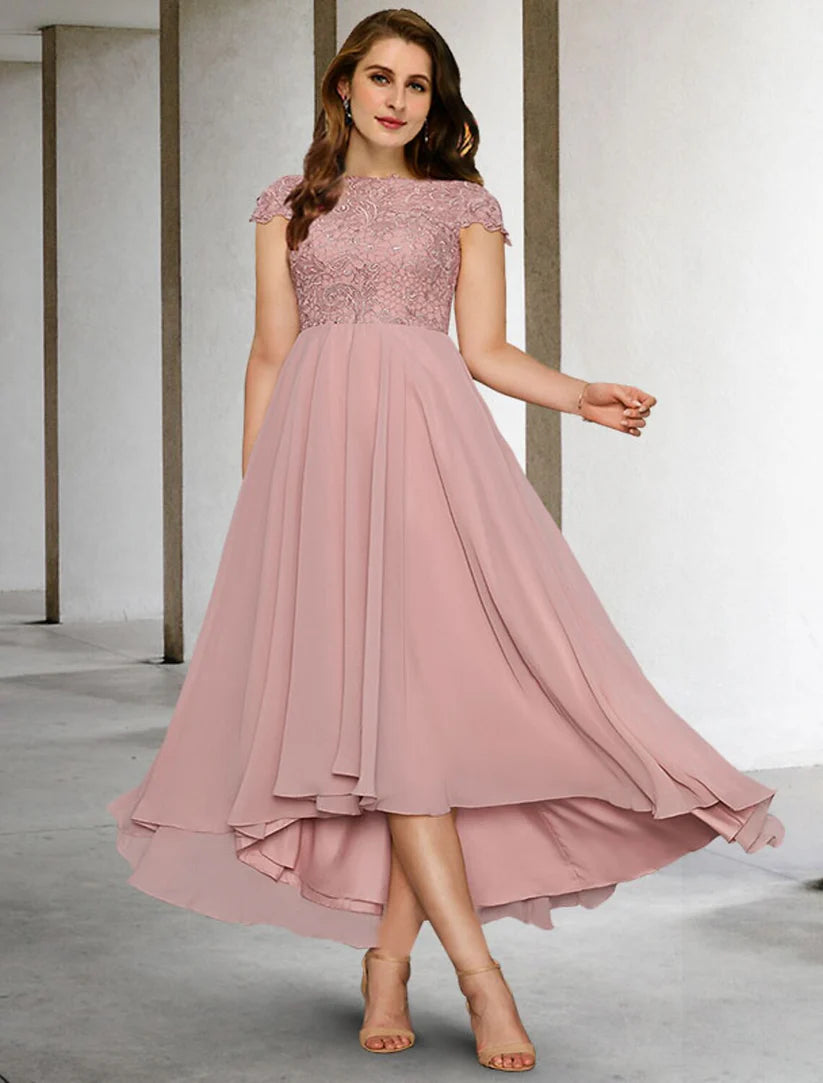 Elegant A-line plus size mother of the bride dress in chiffon with short sleeves, jewel neck, and appliques.
