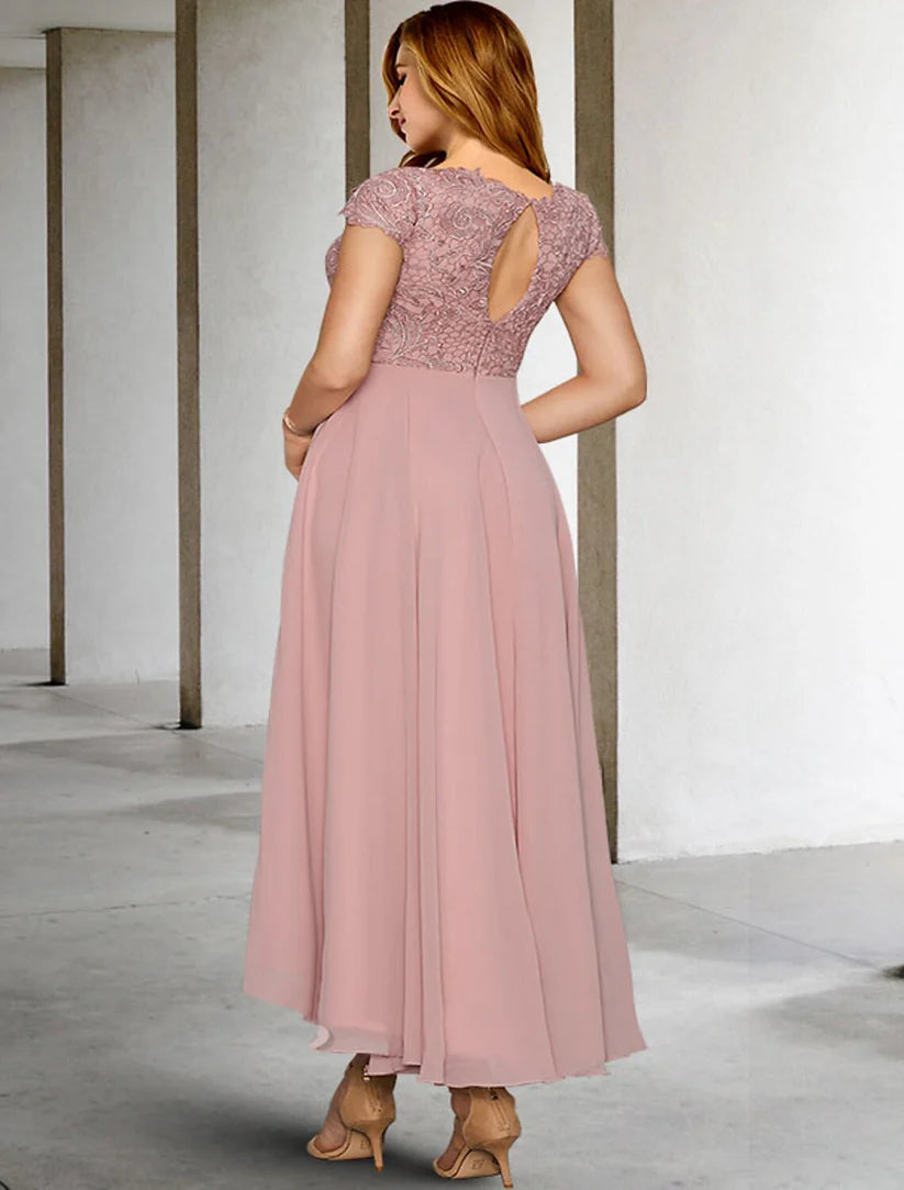 Front view of an A-line plus size mother of the bride dress, highlighting the pleated bodice and flowing skirt.
