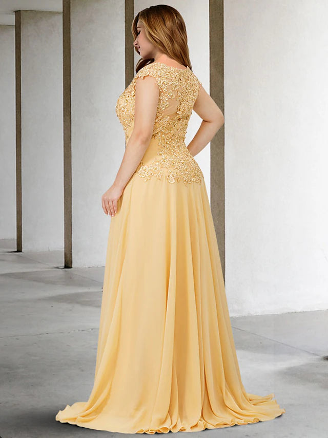 Close-up of the jewel neck and delicate beading appliques on the elegant mother of the bride dress.