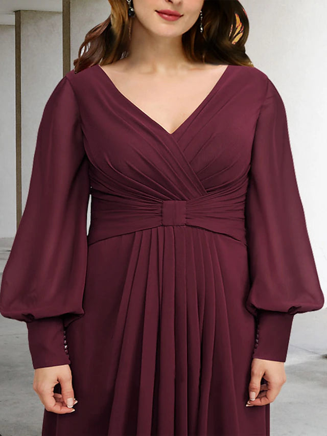 Elegant plus size mother of the bride dress with ruched bodice and floor-length skirt.