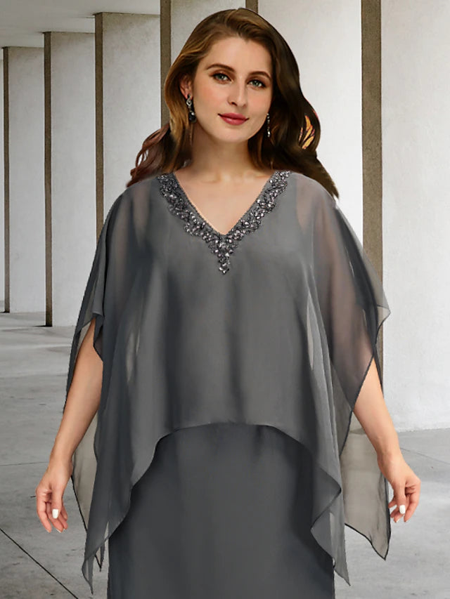 Back view of a formal chiffon gown with delicate beading and ruffles.