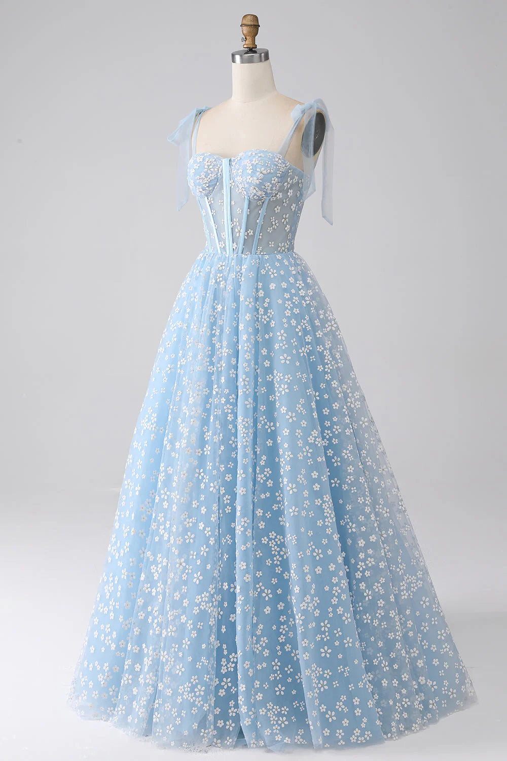 Side view of the A-Line print pleated tiered prom dress with flowing skirt.