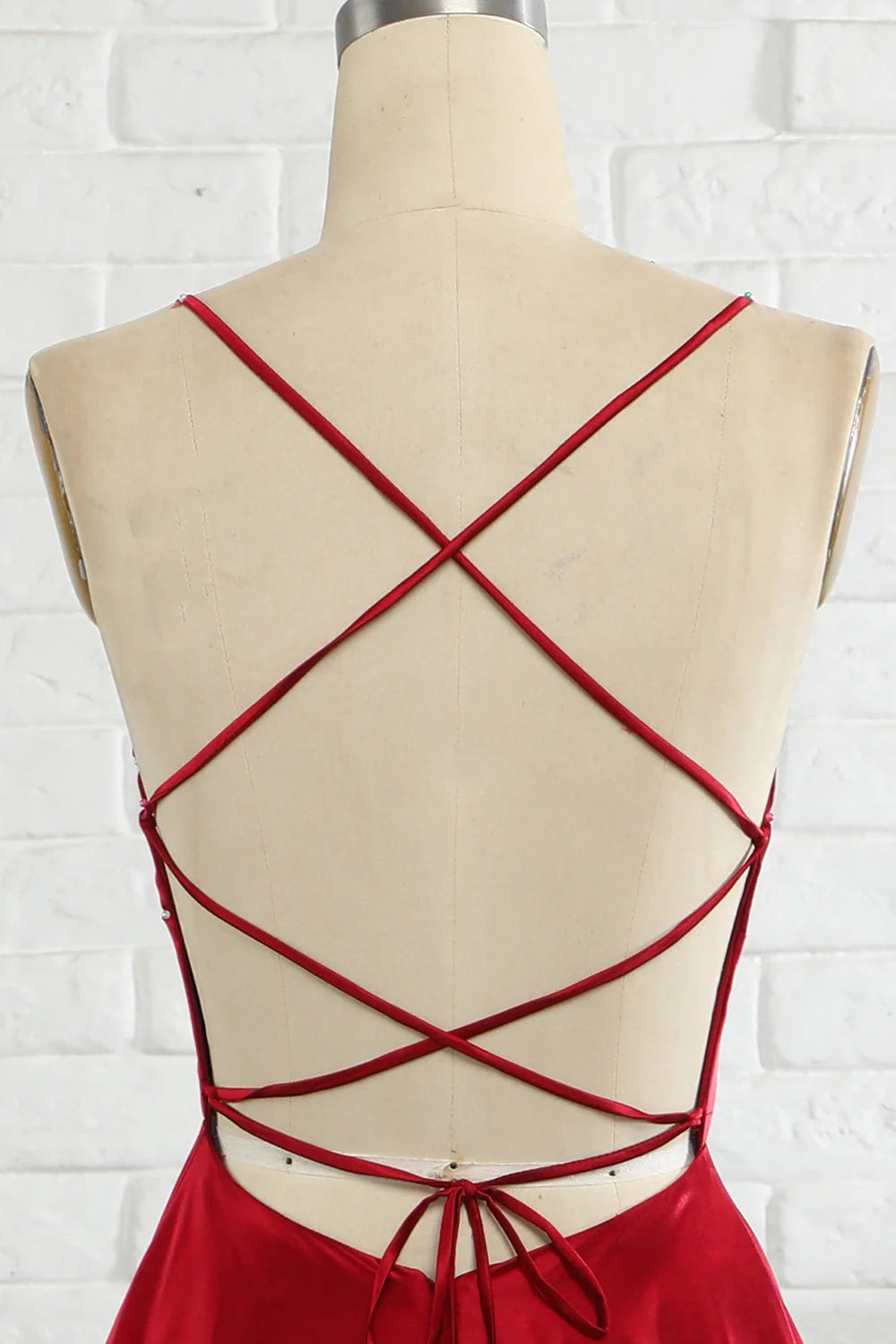 Close-up of the fabric and strap detail on the A-line prom dress.