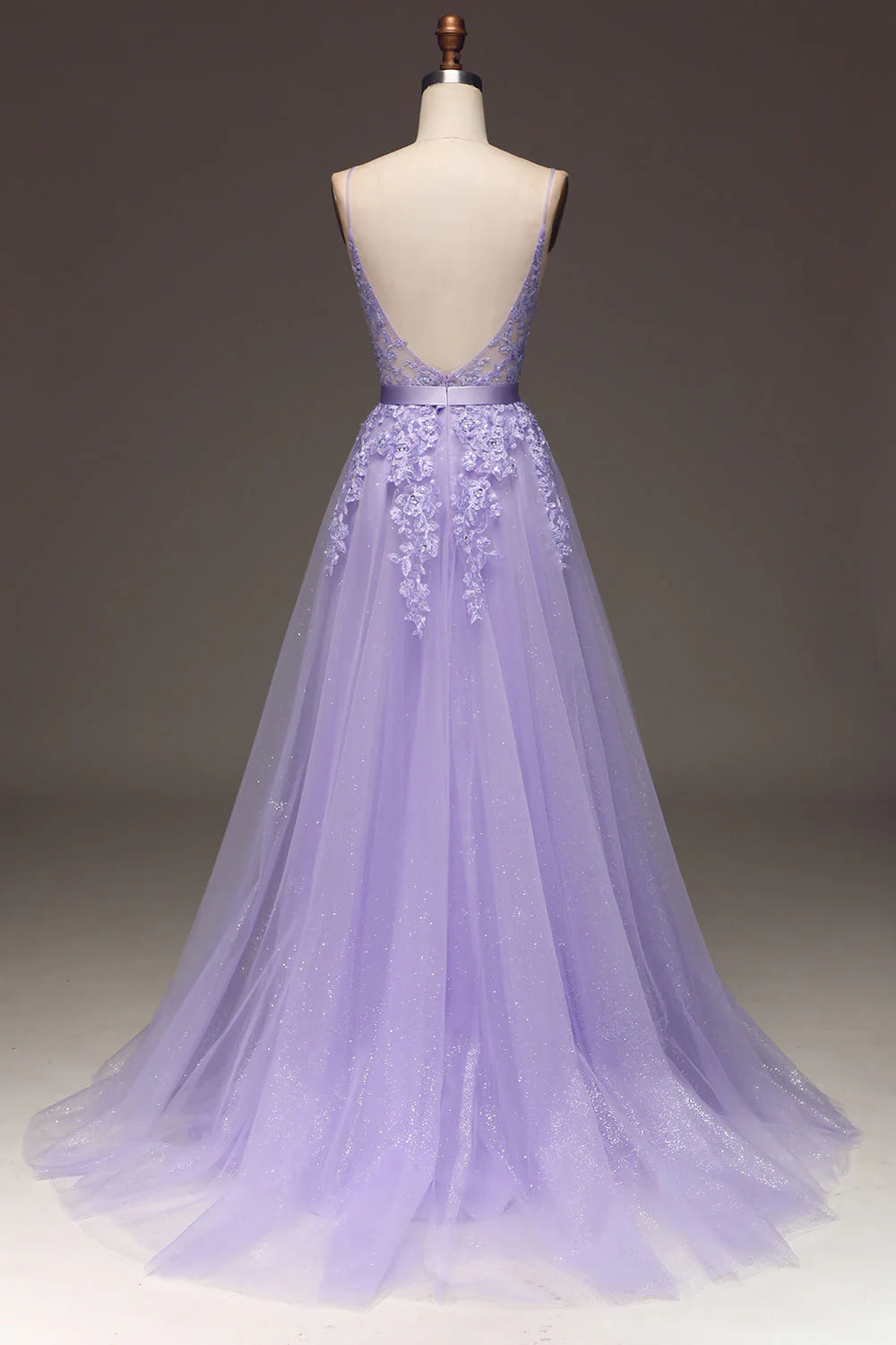 Back view of the purple A-line prom dress showing intricate appliques.