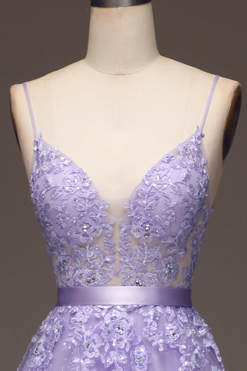 Full length view of the elegant purple A-line prom dress.