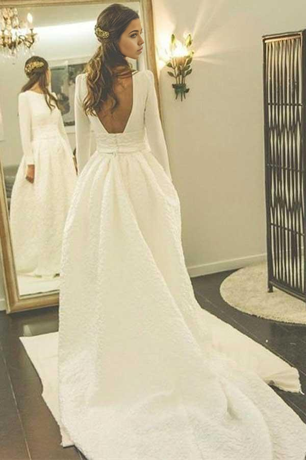 Back view of an A-Line satin wedding dress, showcasing the backless detail and flowing skirt.