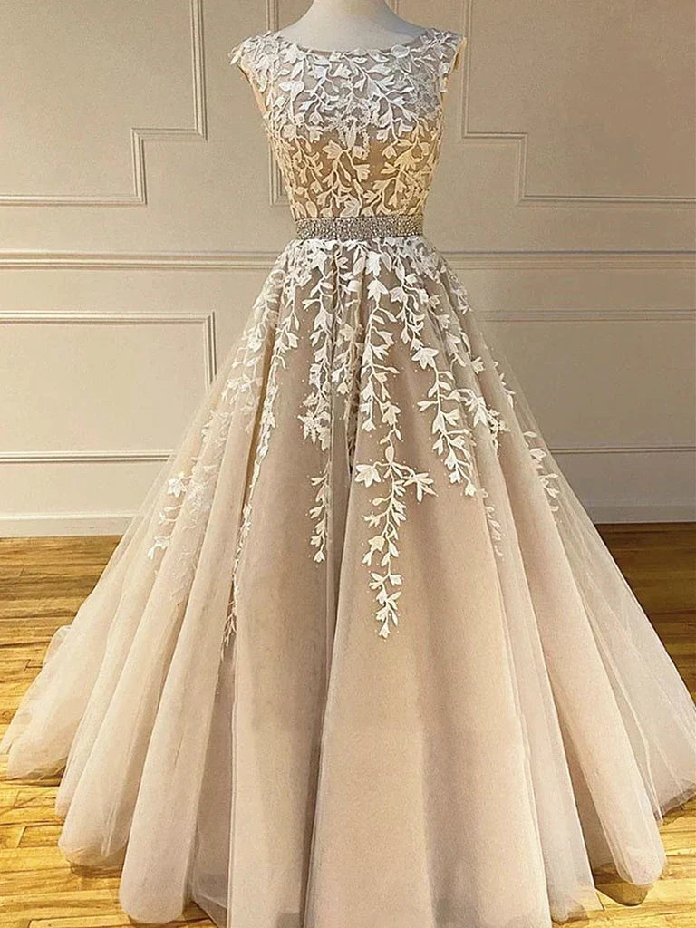Elegant A-line tulle lace long wedding dress with round neck and cap sleeves.