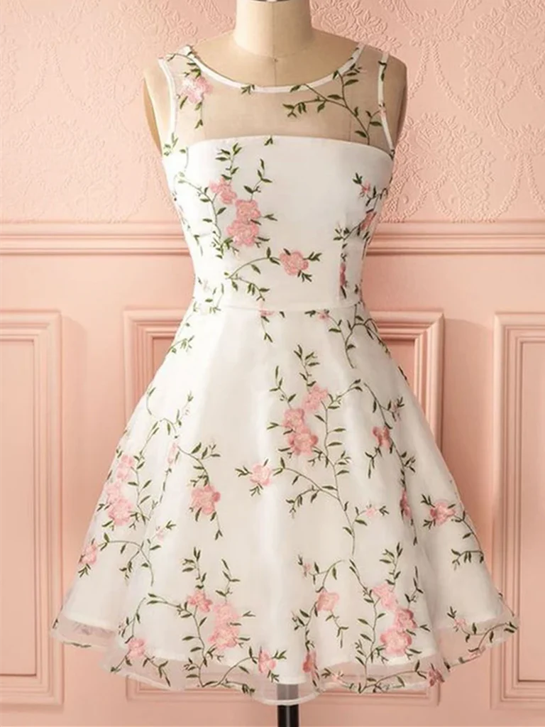 Model wearing an elegant A-line short prom dress with floral lace and a round neck.