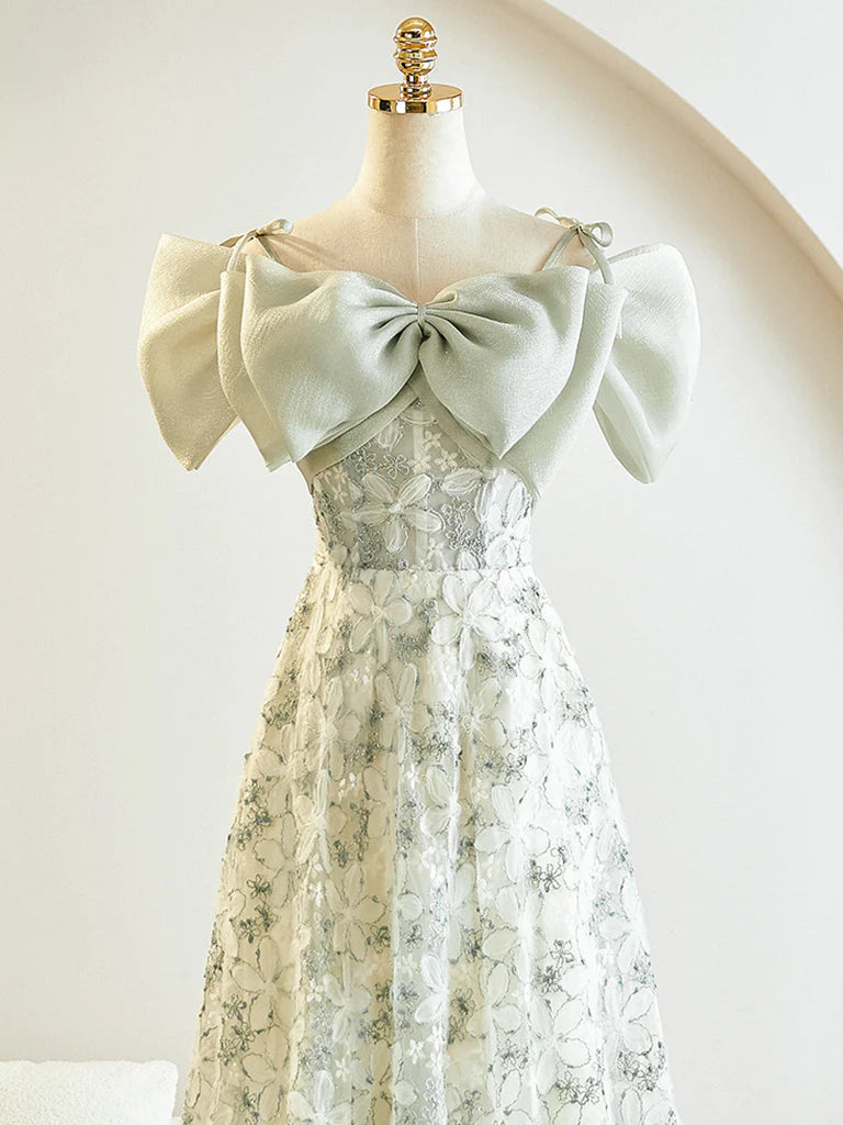 Back view of the elegant lace tea length prom dress.