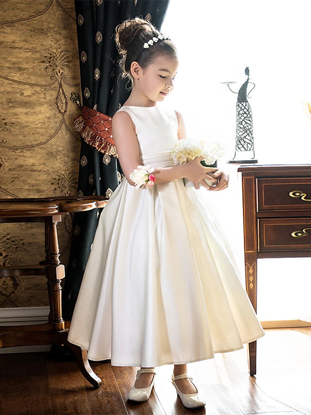 Girl twirling in an elegant A-line dress, showcasing the skirt.