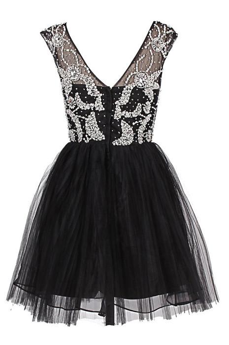 Close-up of the lace detail on the short A-line dress.