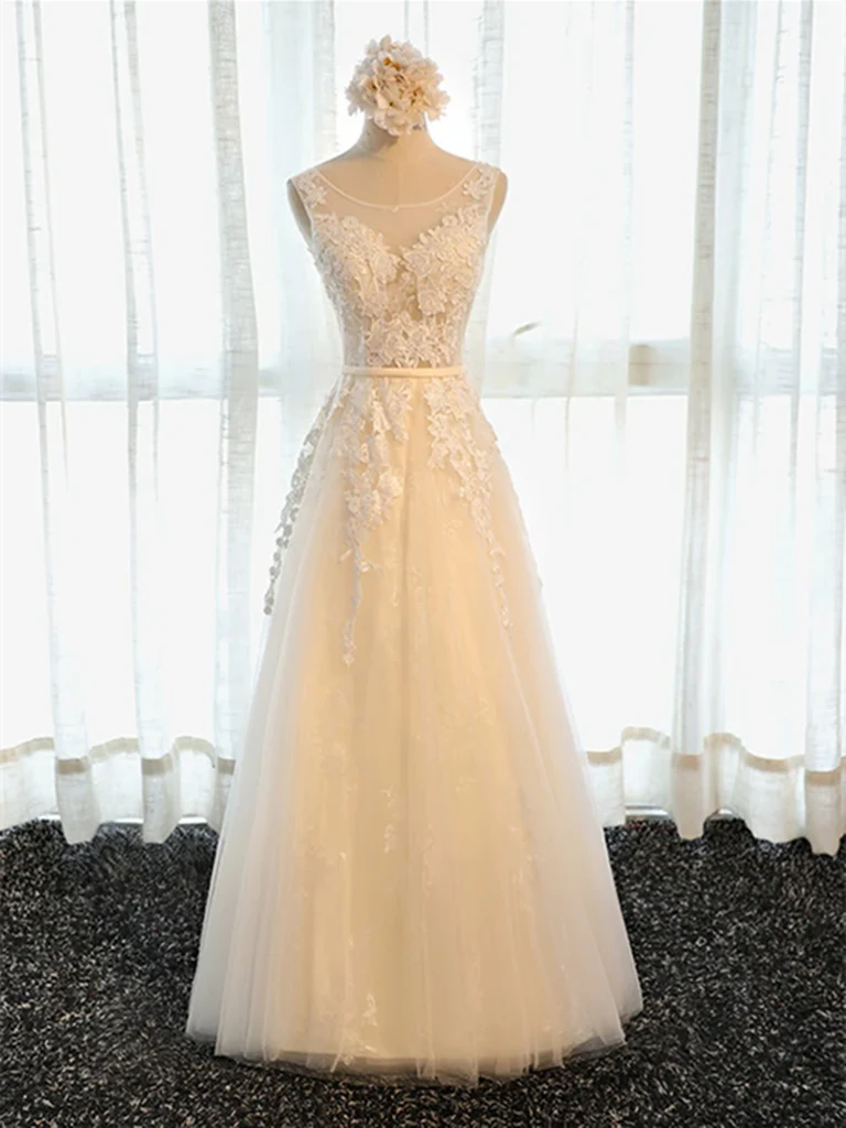 Elegant A-Line long prom dress with round neck and delicate tulle lace.