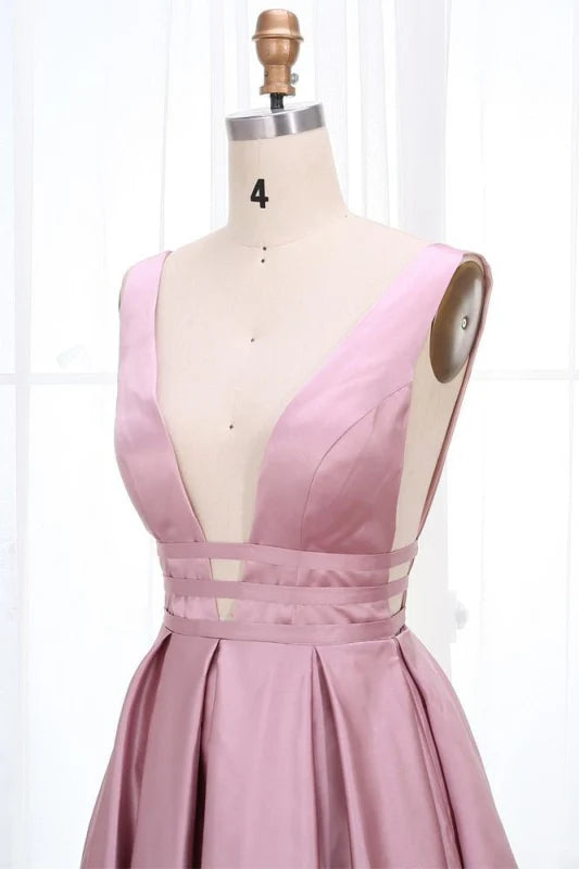Close-up of the ruched detail on the A-line V-neck prom dress.